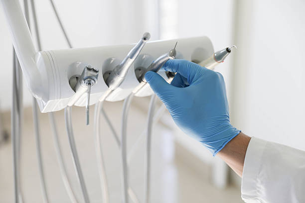 Professional Tooth Extraction technician working in Kingsley, MI